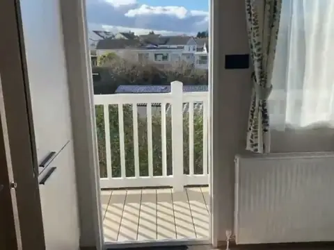 Doorway out onto the decking, with views over the rooftops